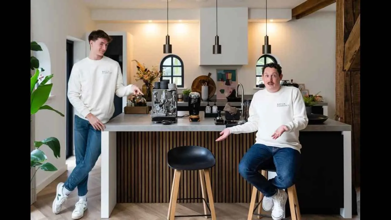 Dad and son setting coffee bar in the kitchen 