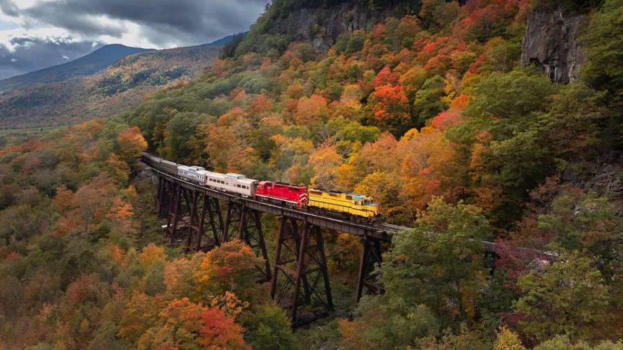 Scenic train at Trestle bridge in North Conway in Autumn, New Hampshire.