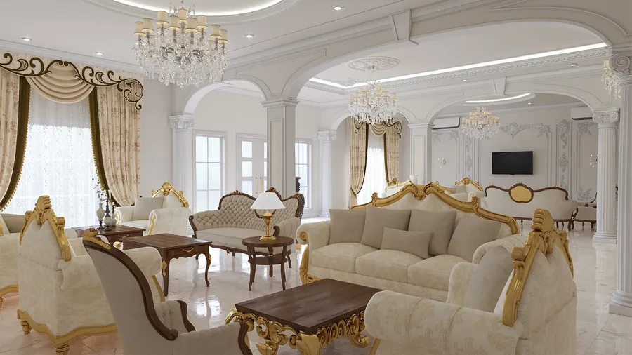 A luxurious, bright living room with white and gold furniture.