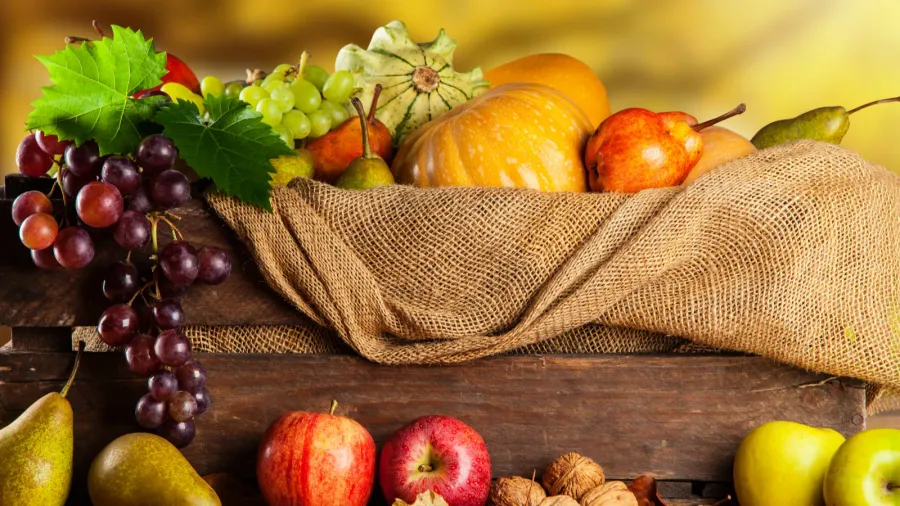 Autumn fruit and vegetable in wooden box