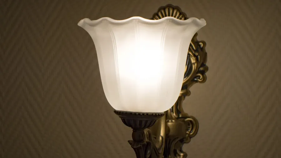 Old vintage lamp on the wall in frosted glass and muted light.