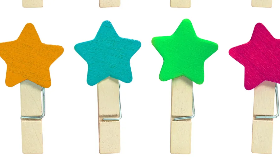 Colorful Wooden clip isolated on white background. Colors clips in star shape. ( Clipping path )
