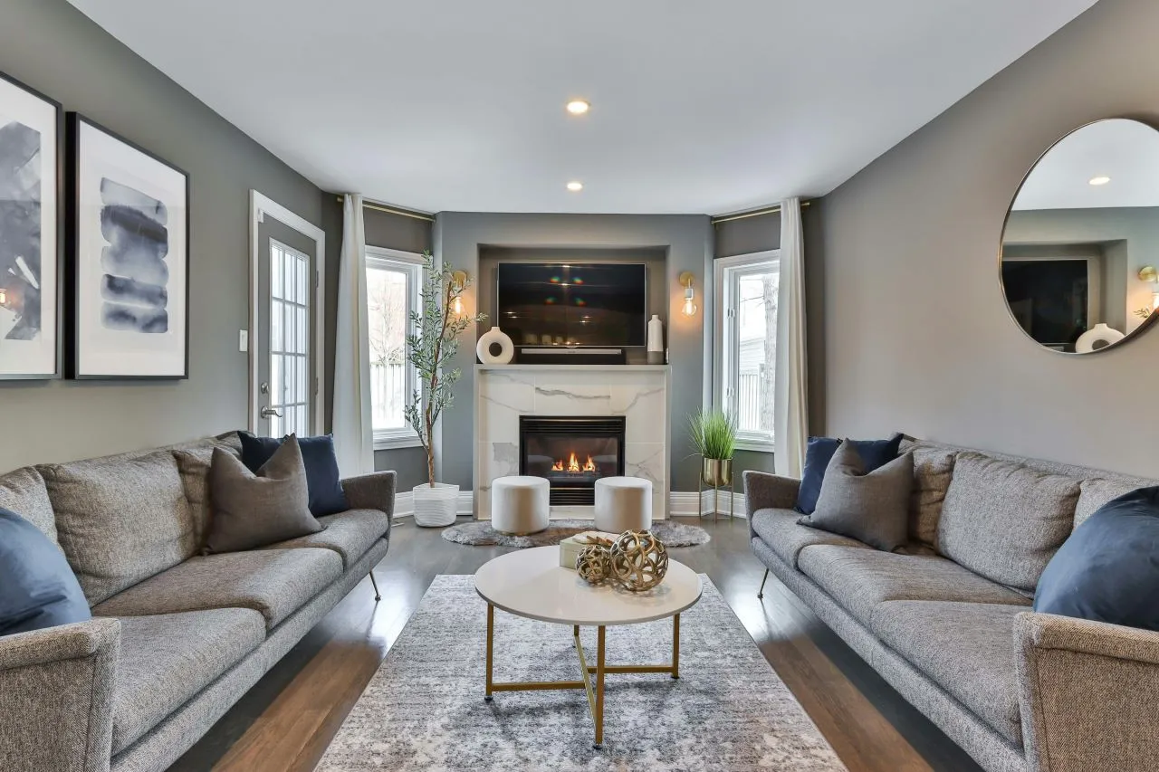 Strategically position furniture to highlight the fireplace.