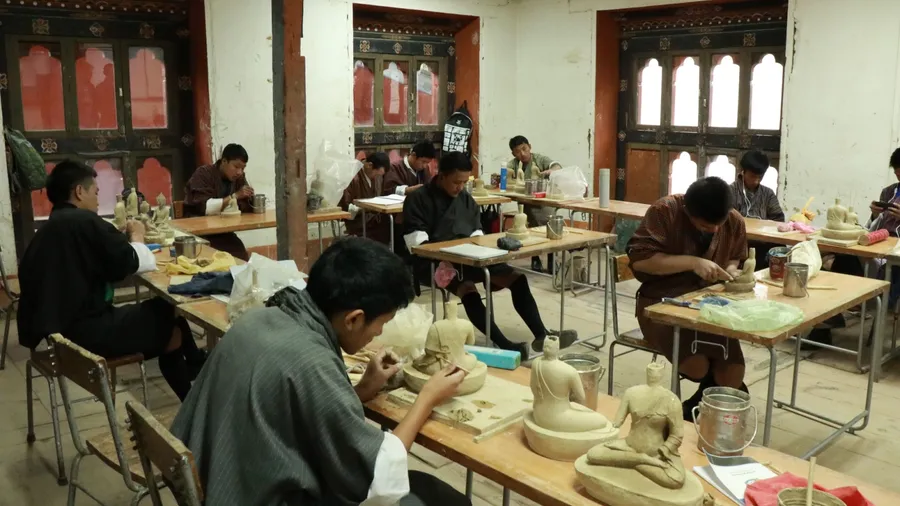 blur picture: Thimphu, Bhutan. April 5,2017: man are craving for tourist at school of art and craft