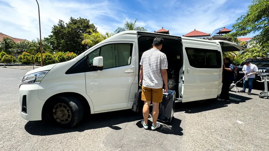 Bali, Indonesia - April 6,2024: Luxury Minivan Toyota Hi Ace car.This car is usually hired for taking tourists sightseeing and traveling to and from the airport.