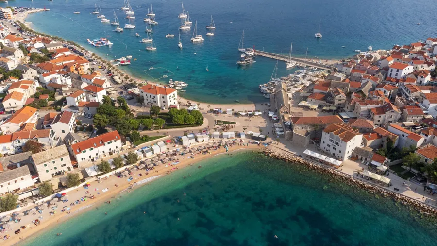 Aerial view of the peninsula with the town of Primosten, Croatia. Bird's-eye view of the coastal strip of land on the Adriatic Sea