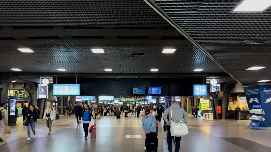 Charleroi, Belgium - June 06, 2024; Passengers walking inside Charleroi airport in Belgium
