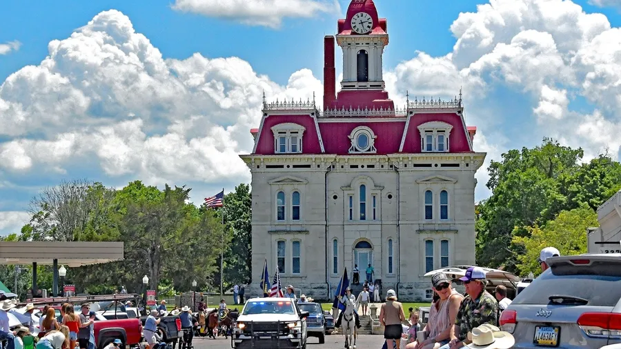 COTTONWOOD FALLS KANSAS , USA - MAY 31, 2025 The 87th annual Flint hills rodeo parade rides through the town of Cottonwood Falls on the way to the rodeo arena 3 miles away in Strong City.