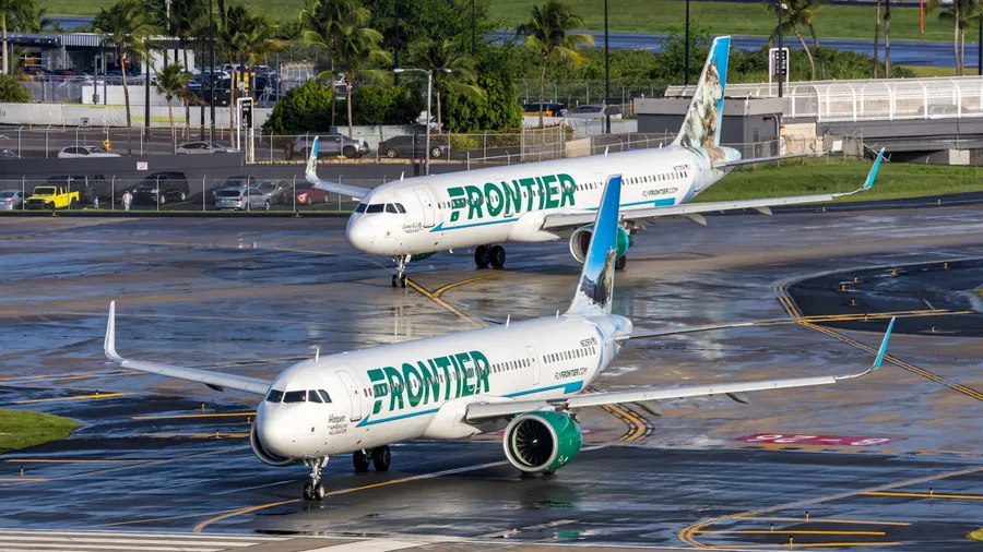 San Juan, Puerto Rico - August 3, 2025: Frontier Airlines Airbus A321neo airplanes at San Juan airport in Puerto Rico.