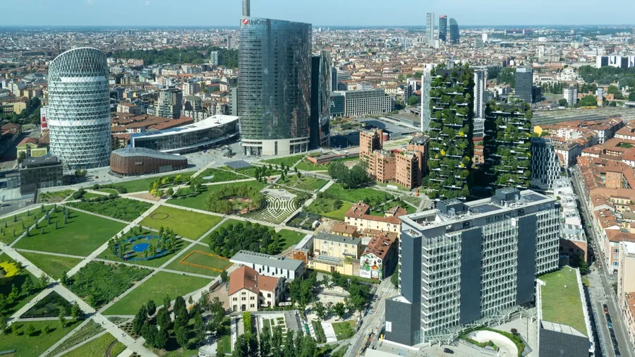 Milano, Italy. July 7, 2024. Amazing aerial landscape of the iconic Unicredit tower, UnipolSai tower, the Bosco Verticale and BAM public park. Super view of the Porta Nuova district