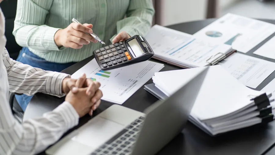 Auditor or internal revenue service staff, Business women checking annual financial statements of company. Audit Concept.