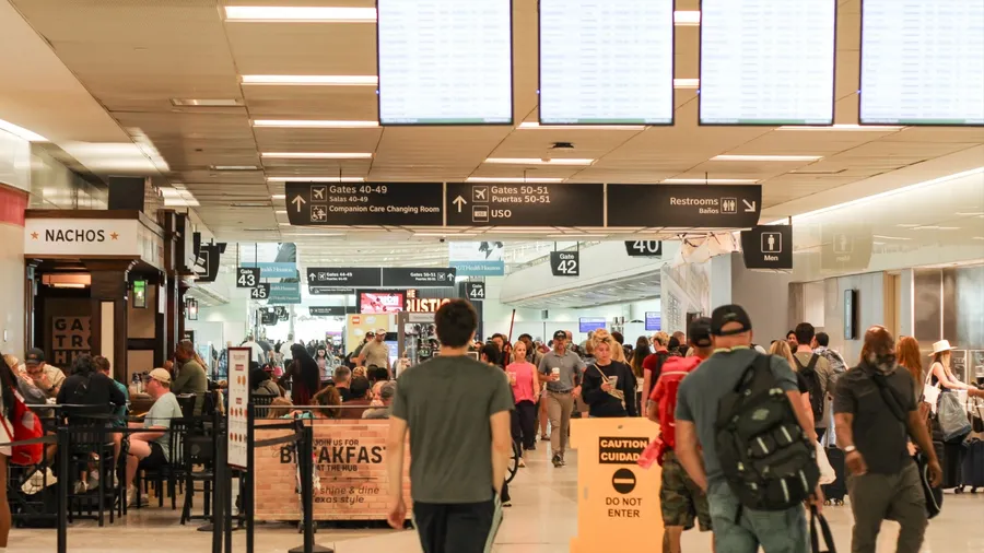 Houston, Texas, USA - July 20 2025: Passengers at Hobby Airport Terminal