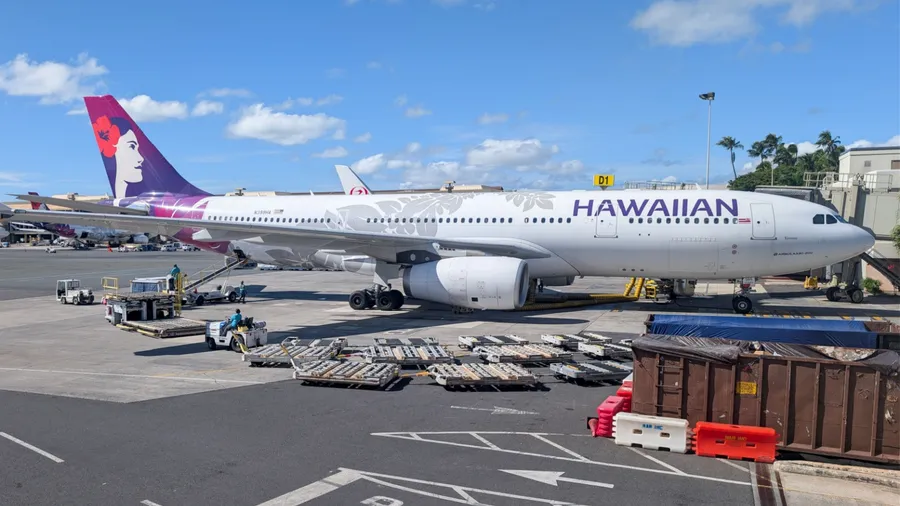 Honolulu, Hawaii - December 22, 2025: Hawaiian Airlines plane at Daniel K. Inouye International Airport