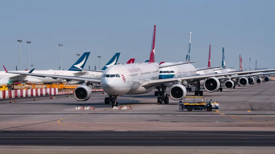 Cathay Pacific Airways Ltd. aircrafts sit parked on the tarmac at Hong Kong International Airport amid travel restrictions due COVID-19 pandemic, on February 17, 2020, China. Photo by Victor Fraile