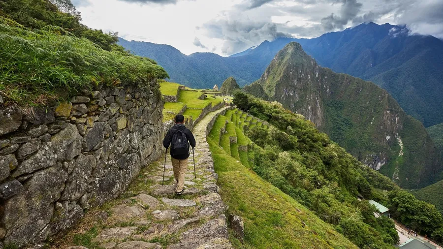 After days of trekking through the ancient Inca Trail, the reward is finally here. Stepping through Inti Punku, the Sun Gate, and witnessing the breathtaking first glimpse of Machu Picchu.
