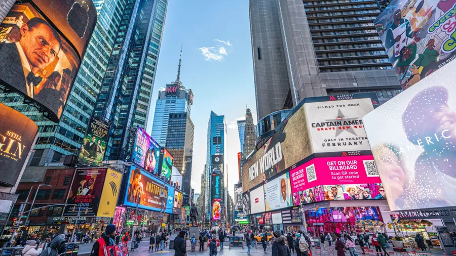 Times Square, Manhattan, New York, U.S.-January 08, 2025: tourists are visiting the Times Square with colorful lights in Manhatan. US