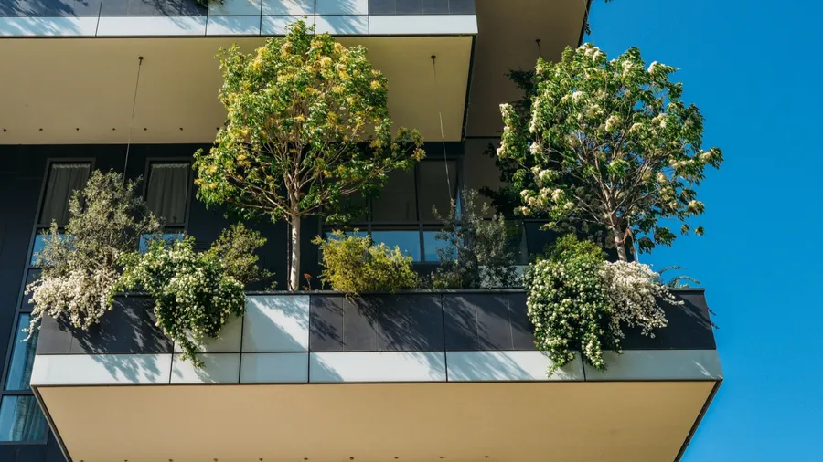 Milan, Italy - April 25, 2018: View of "Bosco Verticale", which means Vertical Forest. These are two upscale residential towers in Milan's Porta Nuova district