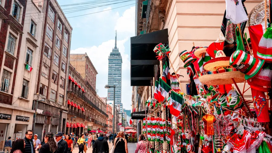 Mexico City, Mexico; September 14, 2024: View of Madero Street and the Latin American Tower, in the month of September, Independence Day decorations.