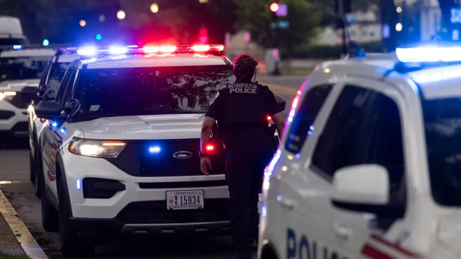 Washington, DC, USA - June 8, 2025: MPDC (Metropolitan Police District of Columbia) police units and officer respond to the scene of an emergency.