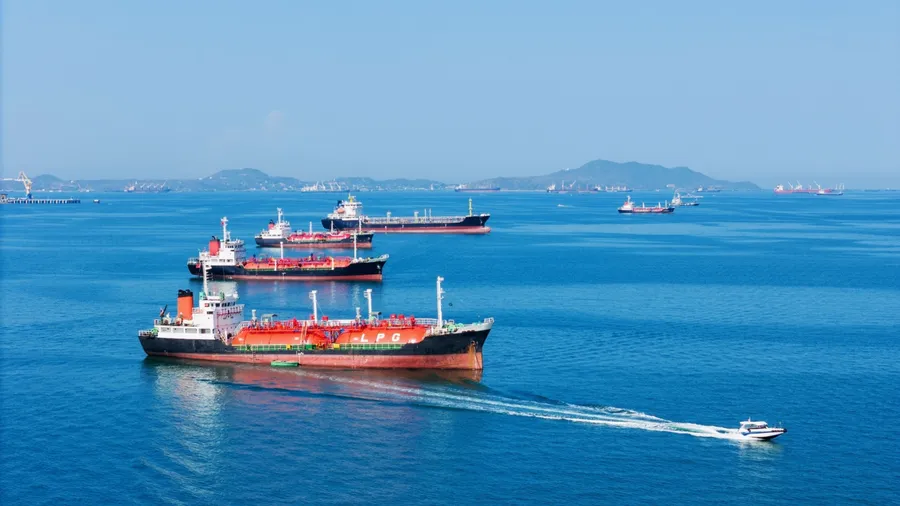 LPG gas and oil tanker ships anchored in the ocean, with a fast patrol boat in the foreground. Global energy transport, war energy crisis, and Strait of Hormuz blockade concept.