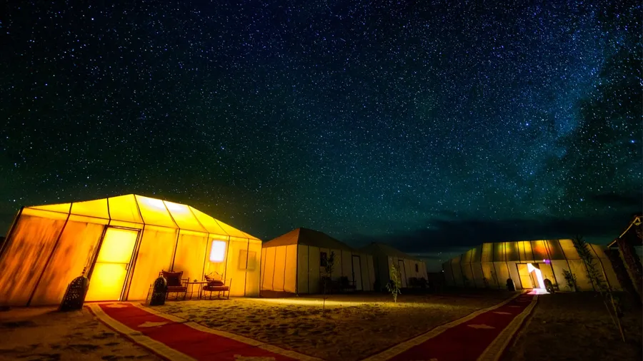 A milky way above a desert camp in Sahara desert in Morocco.