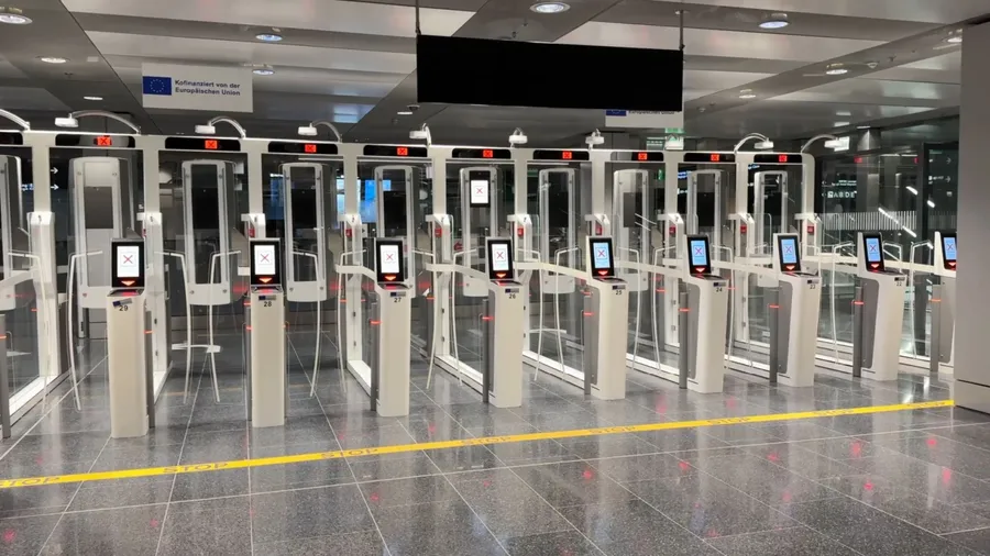 Zurich, Switzerland, December 15, 2024: Empty self-service e-Passport control at Swiss Airport Zürich Kloten at night. Automated passport border control e-gates.