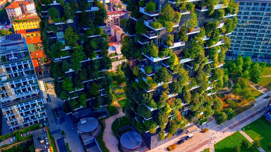 Aerial view of modern and environmentally friendly skyscrapers with many trees on the balconies. Bosco Verticale. Architecture, vertical gardens, terraces. Green Planet. Milan, Italy, 20.08.2024