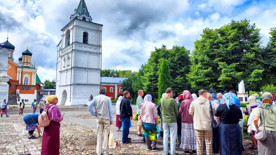 Kostroma, Russia - July 31, 2024: Groups of people explore the historic Ipatievsky Monastery in Kostroma while appreciating the beautiful summer weather
