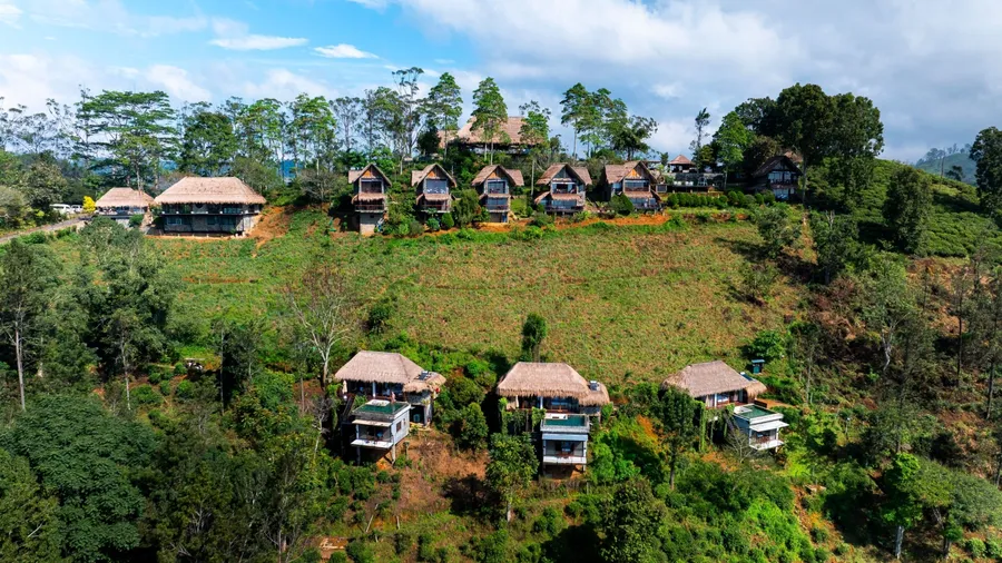 Luxury eco-lodges on the lush hills of Ella, Sri Lanka, offer a serene retreat with stunning mountain views, blending nature with modern comfort and sustainability