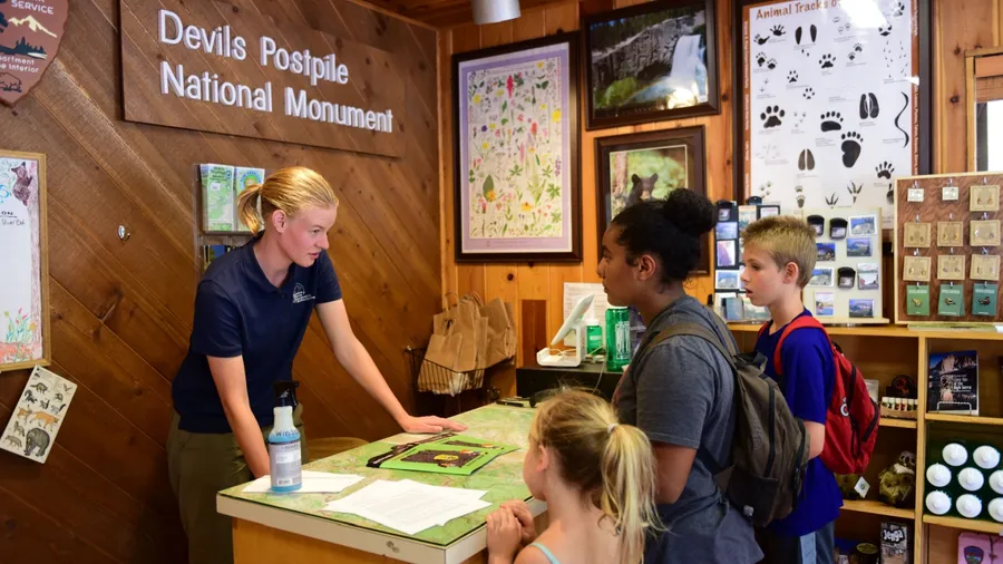 Mammoth Lakes, CA USA - July 25, 2018: Children sign up for the Junior Ranger Program at Devils Postpile National Monument Visitor Center.