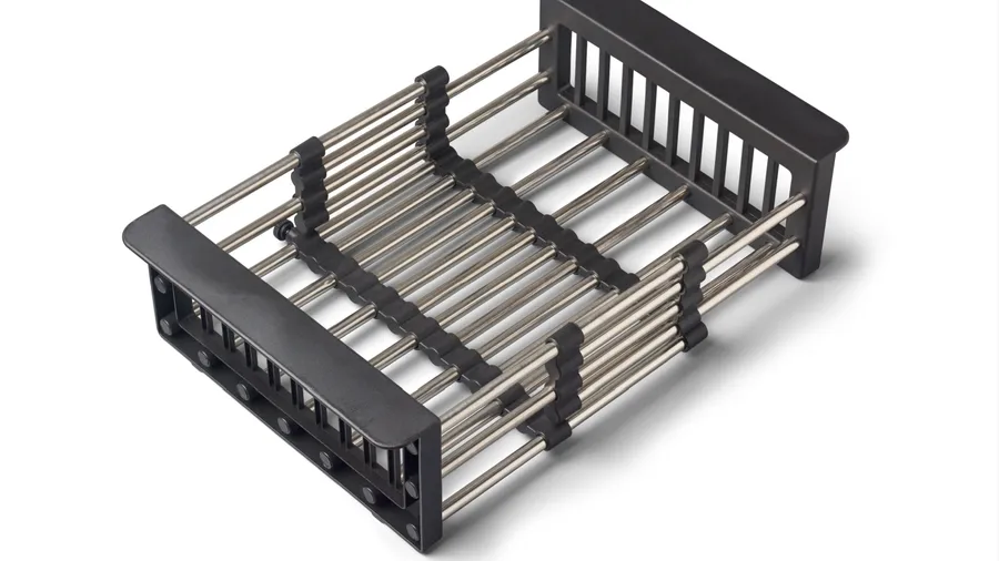 An over-the-sink dish drying rack on a white background.