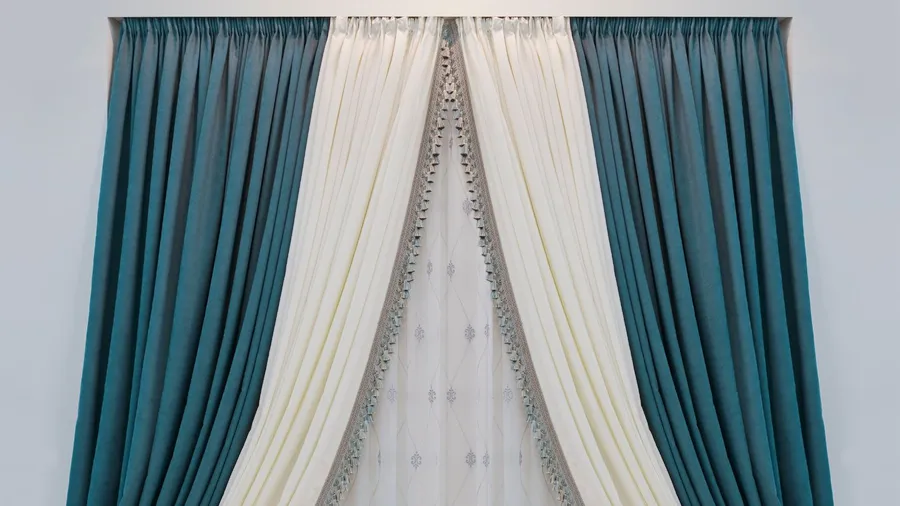 Blue and white velvet curtains on the window.