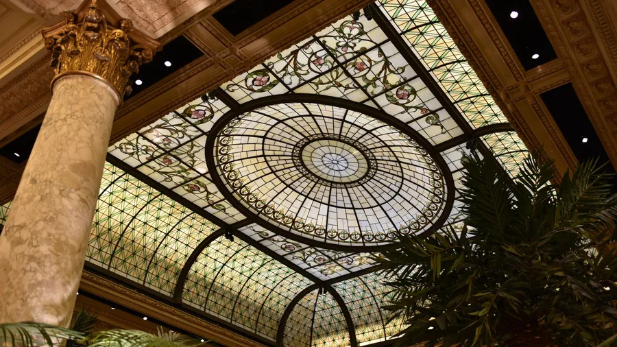 Beautiful ceiling with intricate artwork in the Plaza Hotel.