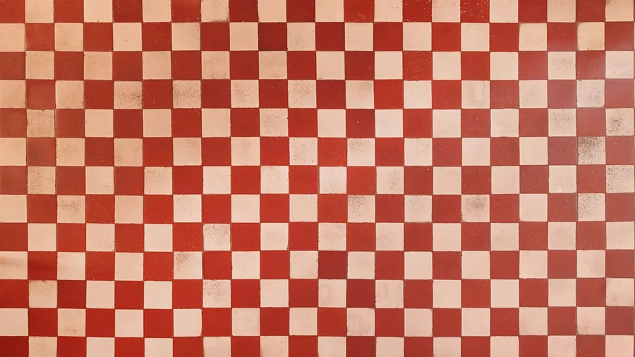 Original 1970s retro wall tiles. Square white and red checkered tiles. Vintage style home decor.