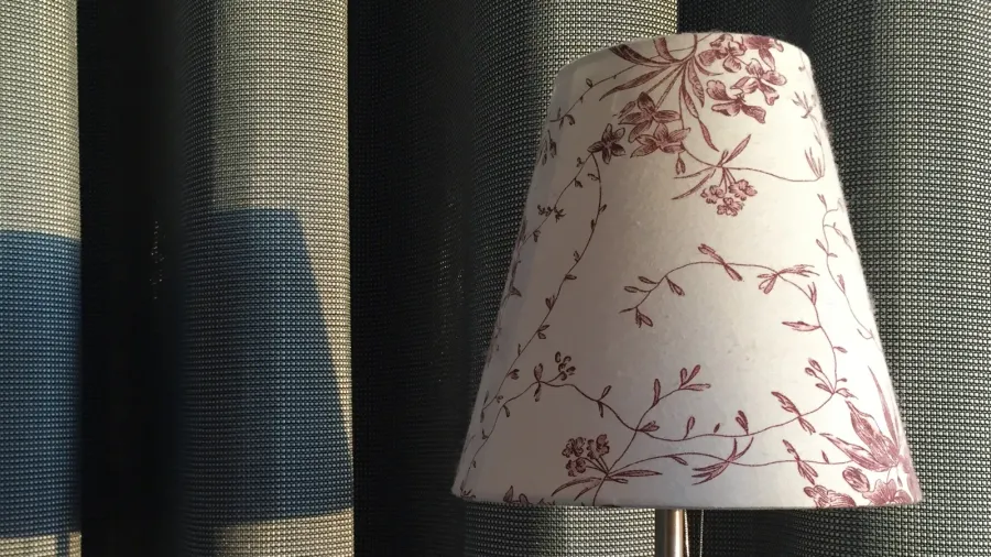 a moment of tranquility with a nightstand lamp at sunset