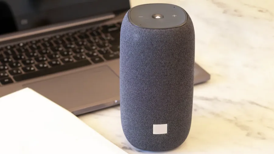 a portable speaker with builtin smart intelligence musical column marble