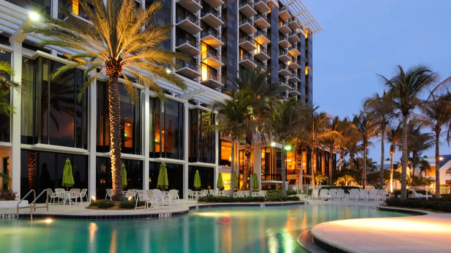 a resort swimming pool at twilight