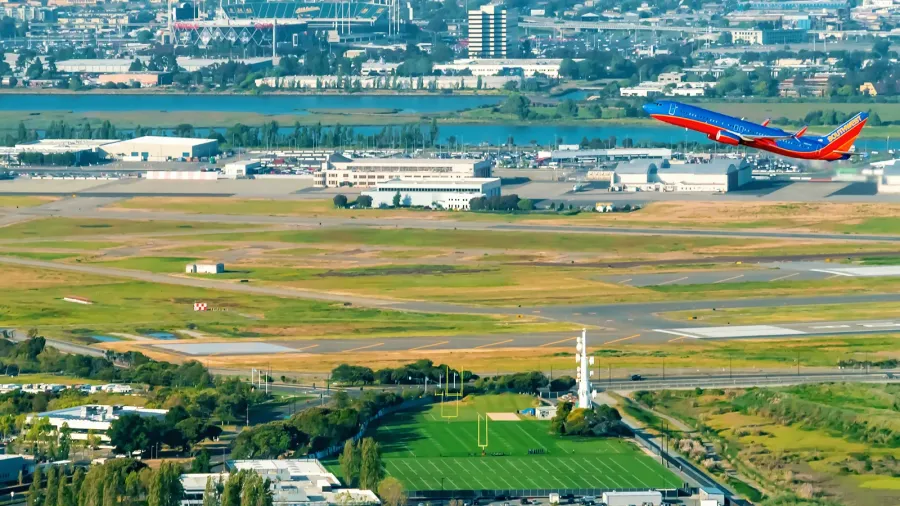 a southwest airlines airplane departs oakland international aiport