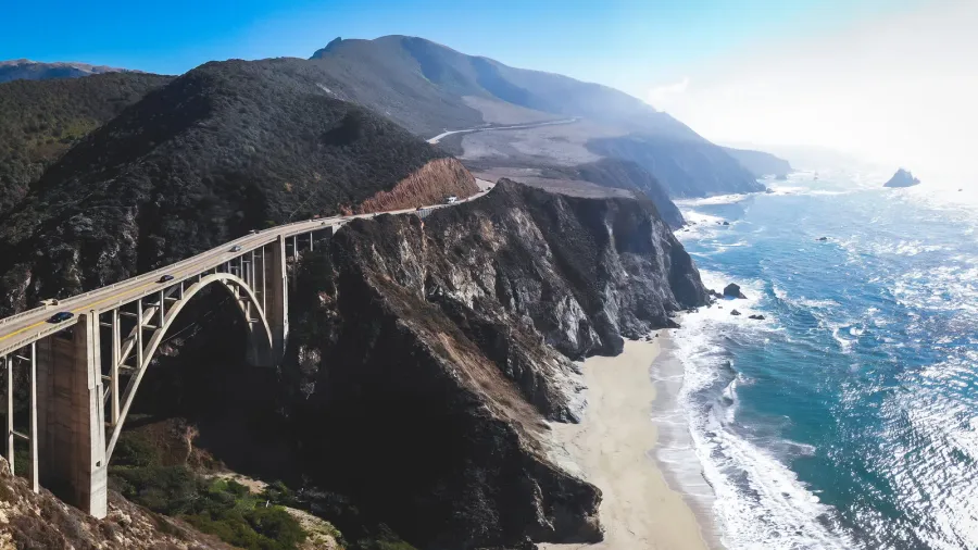 aerial panoramic view of historic bixby creek bridge along world