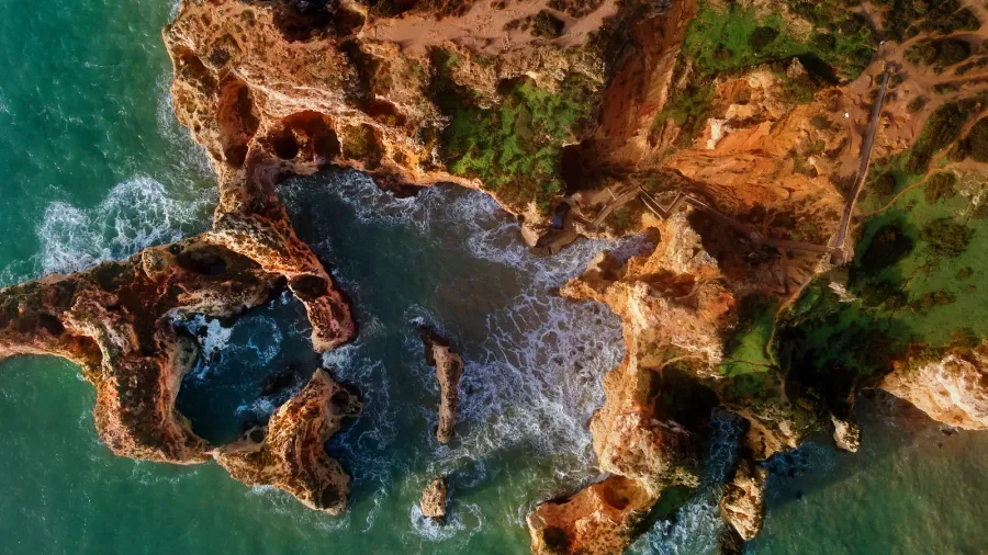 aerial photo view directly from above ponta da piedade headland