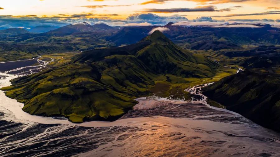 aerial view of an icelandic moss covered mountain surrounded by