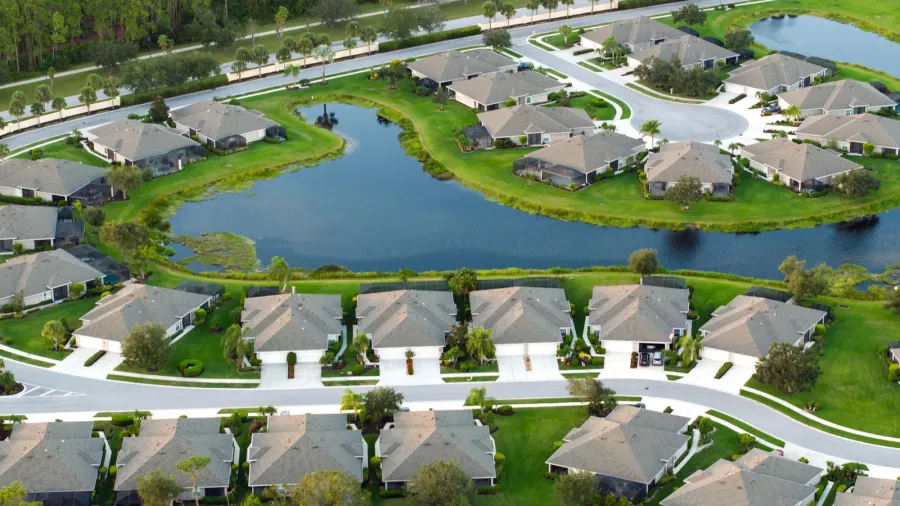 aerial view of expensive residential houses in small town in