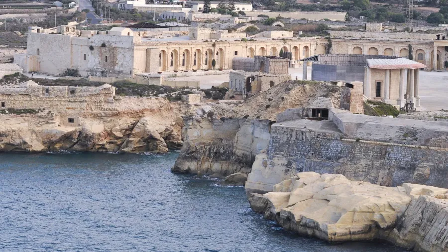 aerial view of fort ricasoli east breakwater waves mediterranean sea