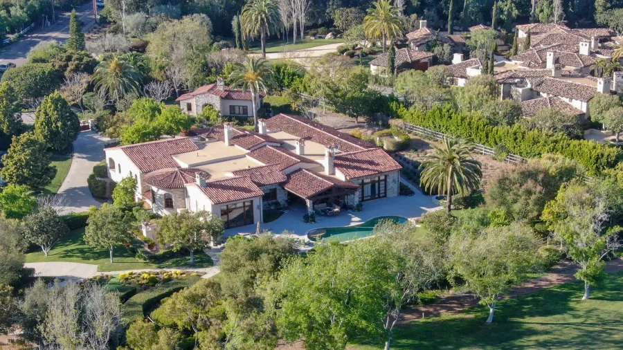 aerial view of wealthy countryside area with luxury villas with