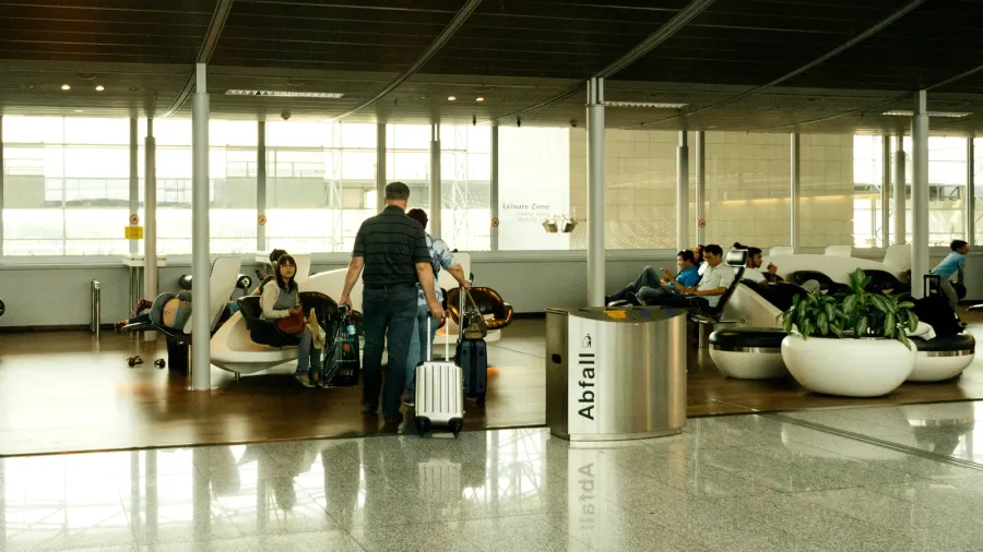 airport lounge with people walking