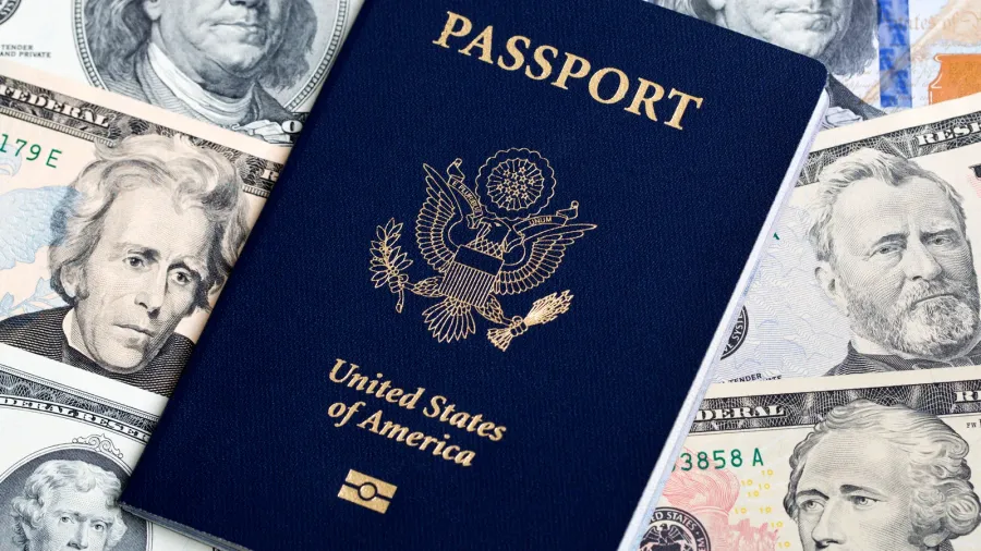 American passport on a US money.