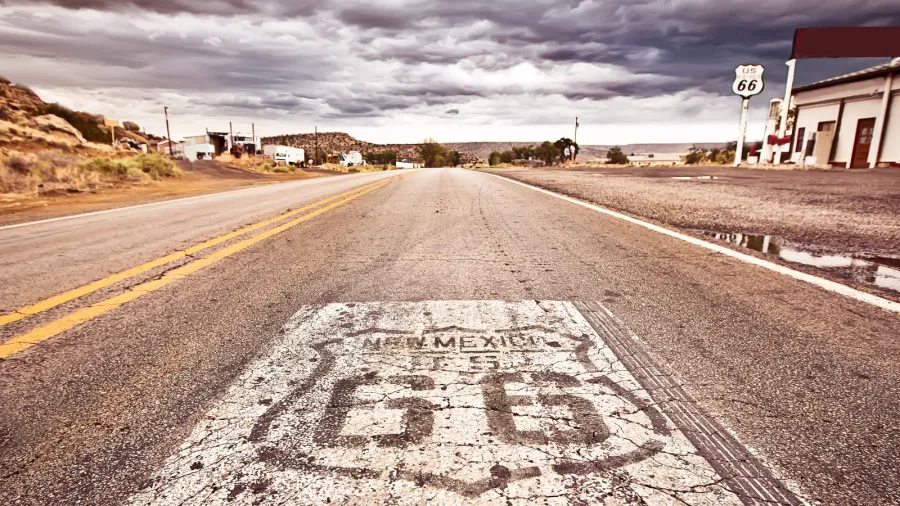 an old route 66 shield painted on road