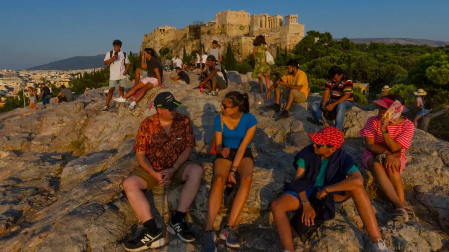 athens greece  19 august 2020  tourists sit upon