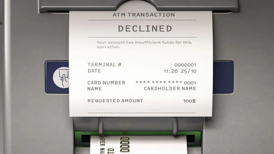 atm machine and receipt with text declined for insufficient funds
