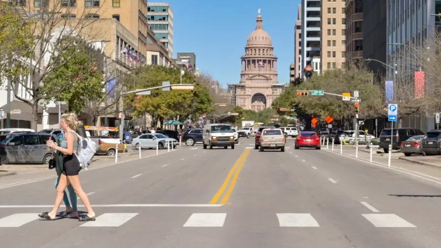 austin texas usa  february 2023 people crosssing one of